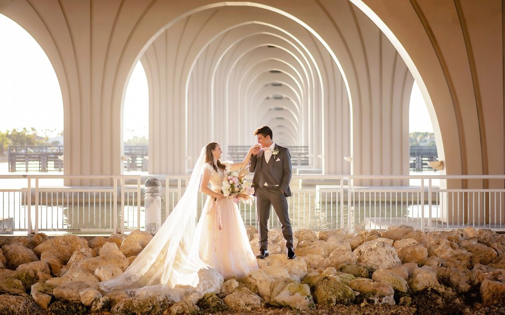 tampa wedding photography, Isla del sol, bride and groom under a bridge
